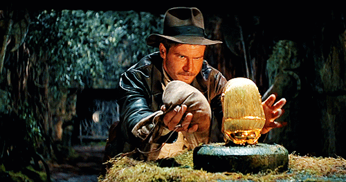 Indiana Jones swapping the golden idol for a bag of sand of matching weight
